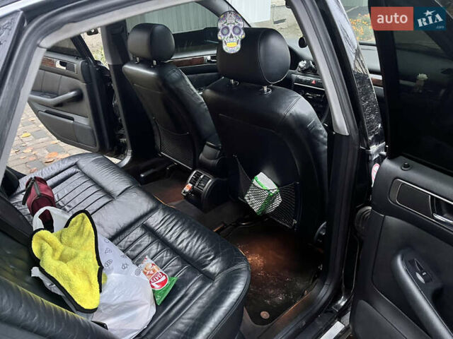 Черный Ауди А6, объемом двигателя 2.5 л и пробегом 325 тыс. км за 4200 $, фото 3 на Automoto.ua