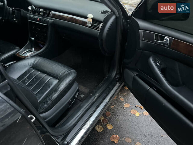 Черный Ауди А6, объемом двигателя 2.5 л и пробегом 325 тыс. км за 4200 $, фото 7 на Automoto.ua
