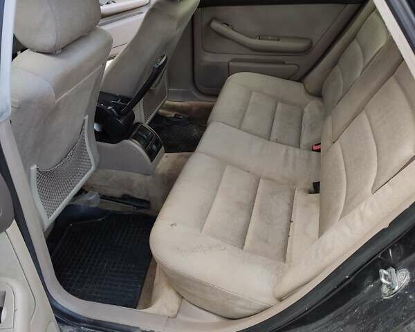Черный Ауди А6, объемом двигателя 2.5 л и пробегом 300 тыс. км за 2900 $, фото 5 на Automoto.ua
