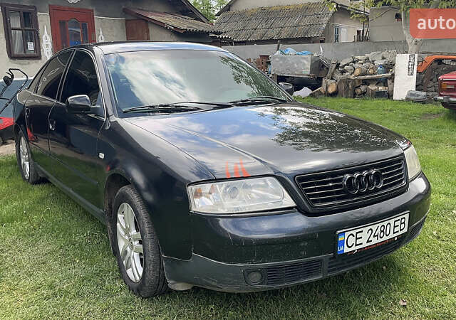 Черный Ауди А6, объемом двигателя 1.9 л и пробегом 320 тыс. км за 4000 $, фото 1 на Automoto.ua