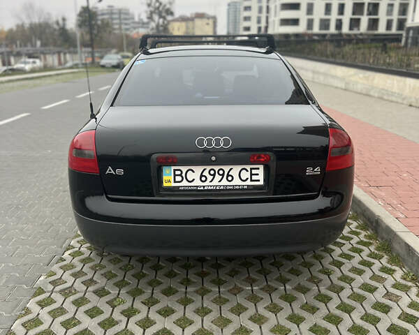 Черный Ауди А6, объемом двигателя 2.4 л и пробегом 285 тыс. км за 5900 $, фото 9 на Automoto.ua
