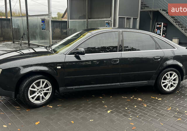 Черный Ауди А6, объемом двигателя 2.5 л и пробегом 328 тыс. км за 4100 $, фото 17 на Automoto.ua