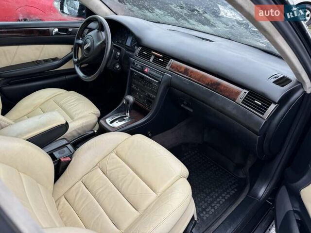 Черный Ауди А6, объемом двигателя 2.4 л и пробегом 250 тыс. км за 2999 $, фото 7 на Automoto.ua