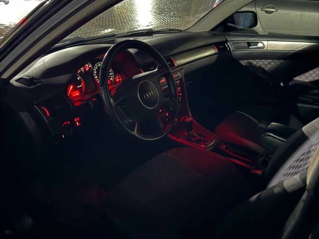 Черный Ауди А6, объемом двигателя 2 л и пробегом 333 тыс. км за 3800 $, фото 3 на Automoto.ua