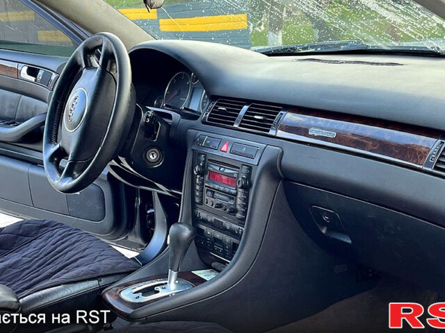 Черный Ауди А6, объемом двигателя 2.5 л и пробегом 420 тыс. км за 3750 $, фото 5 на Automoto.ua