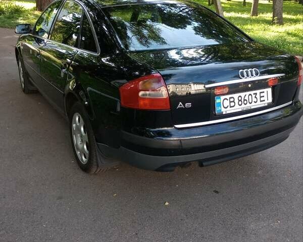 Черный Ауди А6, объемом двигателя 2 л и пробегом 217 тыс. км за 6200 $, фото 2 на Automoto.ua