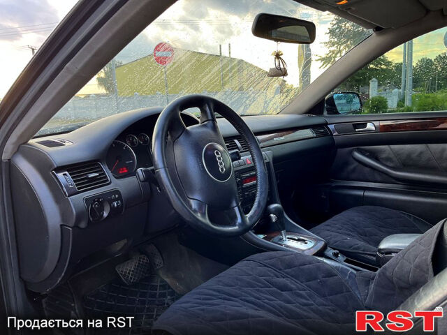 Черный Ауди А6, объемом двигателя 2.5 л и пробегом 420 тыс. км за 3750 $, фото 4 на Automoto.ua