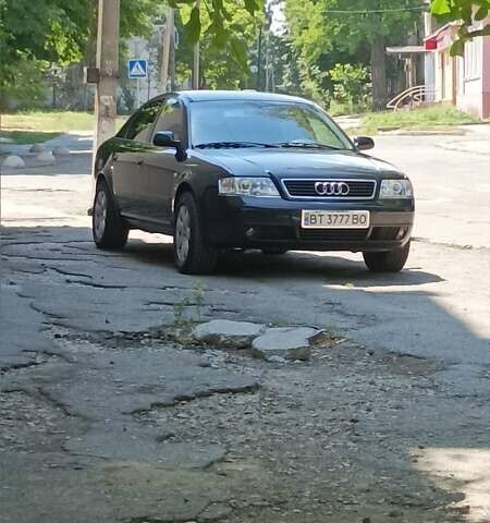 Черный Ауди А6, объемом двигателя 2.4 л и пробегом 400 тыс. км за 7500 $, фото 1 на Automoto.ua