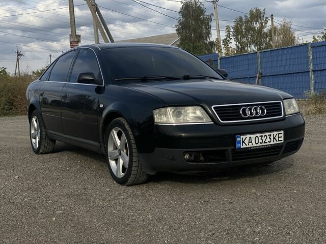 Черный Ауди А6, объемом двигателя 2.8 л и пробегом 320 тыс. км за 3500 $, фото 1 на Automoto.ua