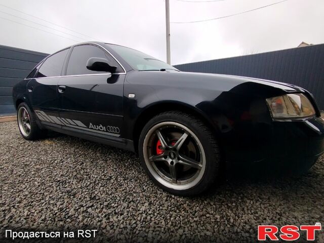 Черный Ауди А6, объемом двигателя 2.5 л и пробегом 310 тыс. км за 3800 $, фото 1 на Automoto.ua