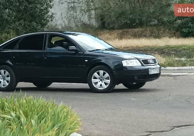 Черный Ауди А6, объемом двигателя 2.4 л и пробегом 400 тыс. км за 7500 $, фото 2 на Automoto.ua