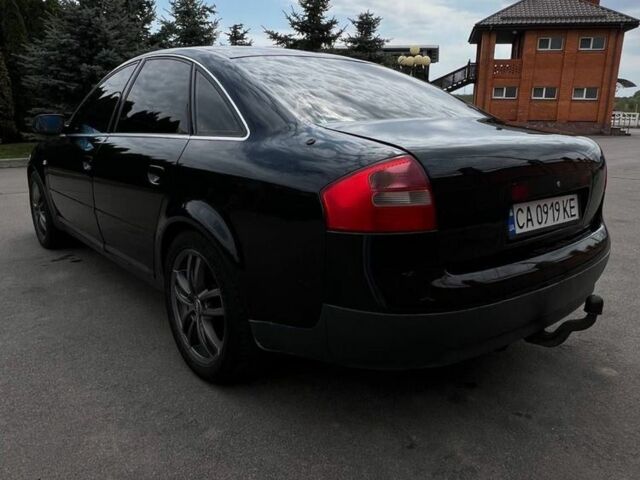 Черный Ауди А6, объемом двигателя 2.4 л и пробегом 500 тыс. км за 3500 $, фото 1 на Automoto.ua