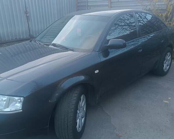 Черный Ауди А6, объемом двигателя 2.4 л и пробегом 442 тыс. км за 4800 $, фото 2 на Automoto.ua