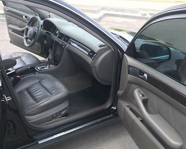 Черный Ауди А6, объемом двигателя 2.5 л и пробегом 295 тыс. км за 6500 $, фото 8 на Automoto.ua