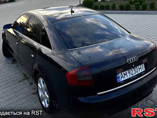 Черный Ауди А6, объемом двигателя 2.5 л и пробегом 420 тыс. км за 3750 $, фото 1 на Automoto.ua