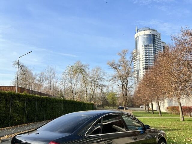 Черный Ауди А6, объемом двигателя 1.8 л и пробегом 400 тыс. км за 4600 $, фото 1 на Automoto.ua