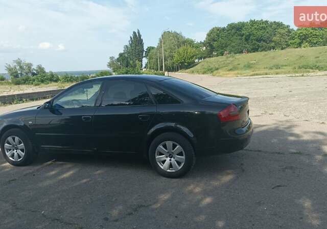 Черный Ауди А6, объемом двигателя 2.4 л и пробегом 400 тыс. км за 7500 $, фото 4 на Automoto.ua