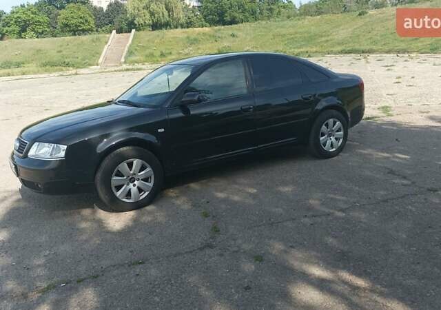 Черный Ауди А6, объемом двигателя 2.4 л и пробегом 400 тыс. км за 7500 $, фото 3 на Automoto.ua