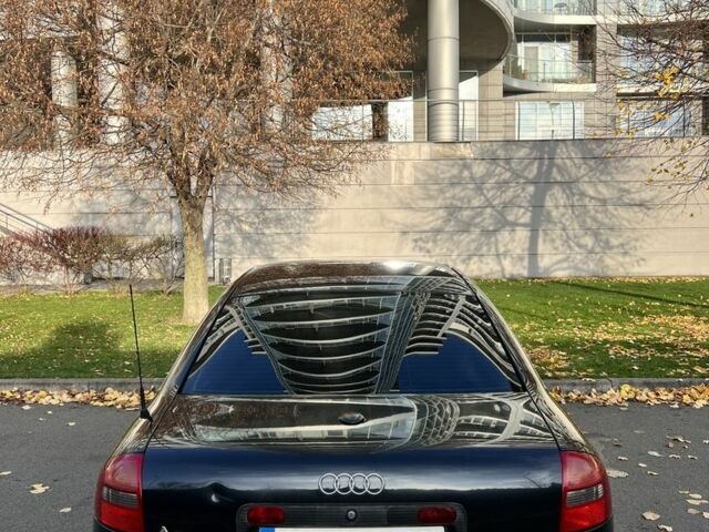 Черный Ауди А6, объемом двигателя 1.8 л и пробегом 400 тыс. км за 4600 $, фото 4 на Automoto.ua