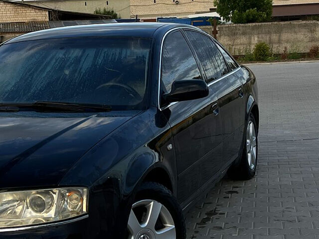 Черный Ауди А6, объемом двигателя 2.5 л и пробегом 420 тыс. км за 3750 $, фото 2 на Automoto.ua