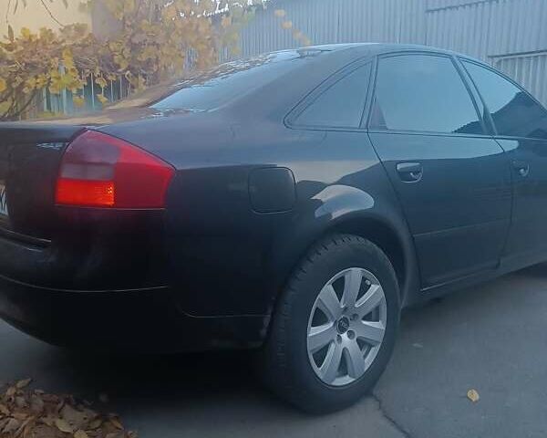 Черный Ауди А6, объемом двигателя 2.4 л и пробегом 442 тыс. км за 4800 $, фото 5 на Automoto.ua