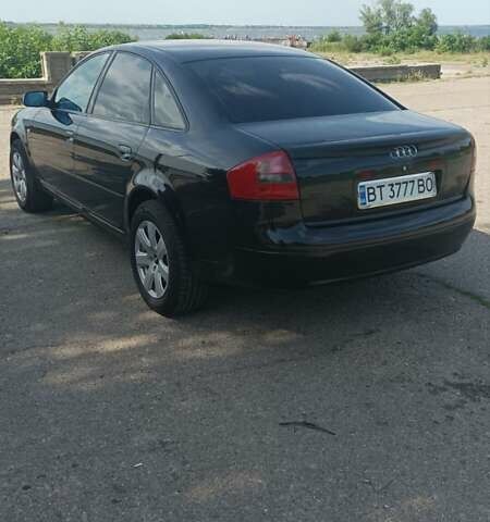 Черный Ауди А6, объемом двигателя 2.4 л и пробегом 400 тыс. км за 7500 $, фото 6 на Automoto.ua