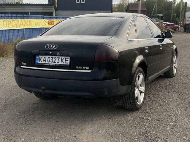 Черный Ауди А6, объемом двигателя 2.8 л и пробегом 320 тыс. км за 3500 $, фото 4 на Automoto.ua