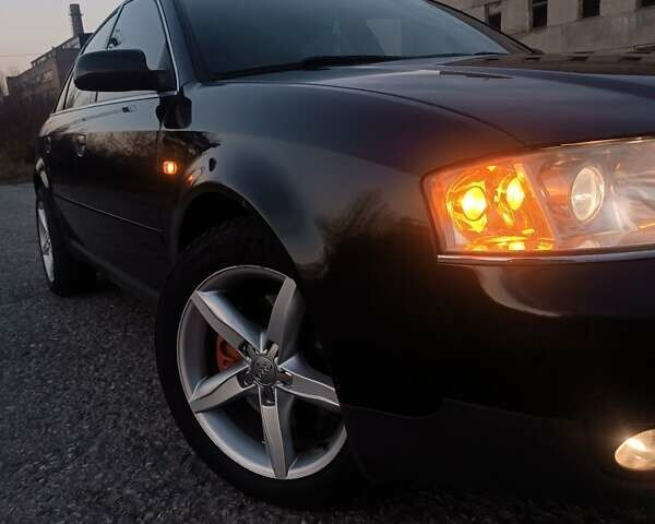 Черный Ауди А6, объемом двигателя 2.5 л и пробегом 396 тыс. км за 5150 $, фото 1 на Automoto.ua