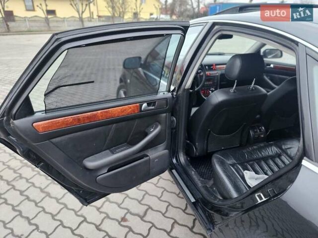 Черный Ауди А6, объемом двигателя 2.5 л и пробегом 433 тыс. км за 5500 $, фото 5 на Automoto.ua