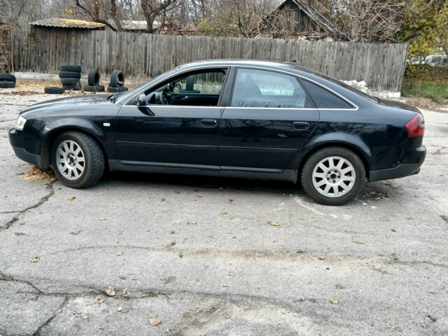 Черный Ауди А6, объемом двигателя 2.4 л и пробегом 380 тыс. км за 4100 $, фото 1 на Automoto.ua