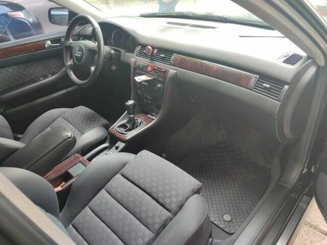 Черный Ауди А6, объемом двигателя 2.5 л и пробегом 335 тыс. км за 4800 $, фото 4 на Automoto.ua