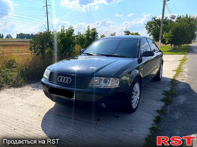 Черный Ауди А6, объемом двигателя 1.8 л и пробегом 350 тыс. км за 2800 $, фото 1 на Automoto.ua