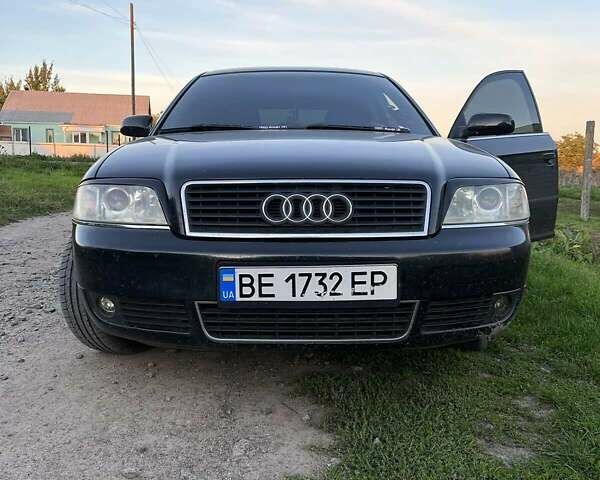 Черный Ауди А6, объемом двигателя 2.5 л и пробегом 282 тыс. км за 5700 $, фото 1 на Automoto.ua