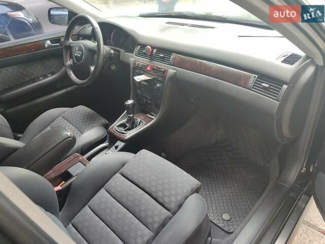 Черный Ауди А6, объемом двигателя 2.5 л и пробегом 335 тыс. км за 4800 $, фото 4 на Automoto.ua