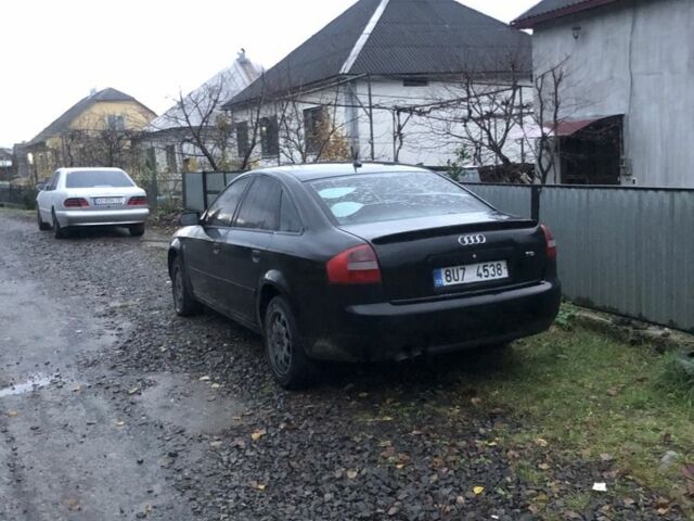 Черный Ауди А6, объемом двигателя 2.5 л и пробегом 301 тыс. км за 1700 $, фото 1 на Automoto.ua