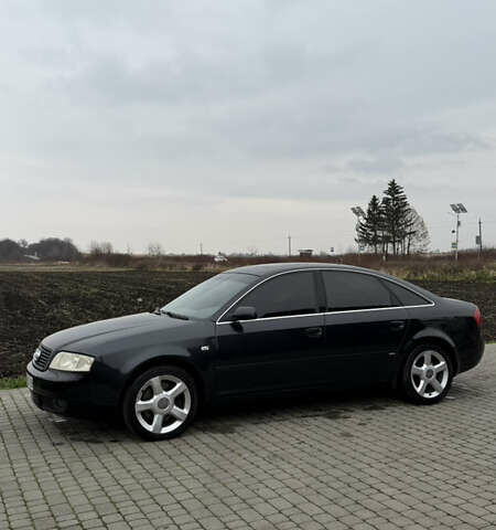 Черный Ауди А6, объемом двигателя 2.5 л и пробегом 344 тыс. км за 5300 $, фото 1 на Automoto.ua