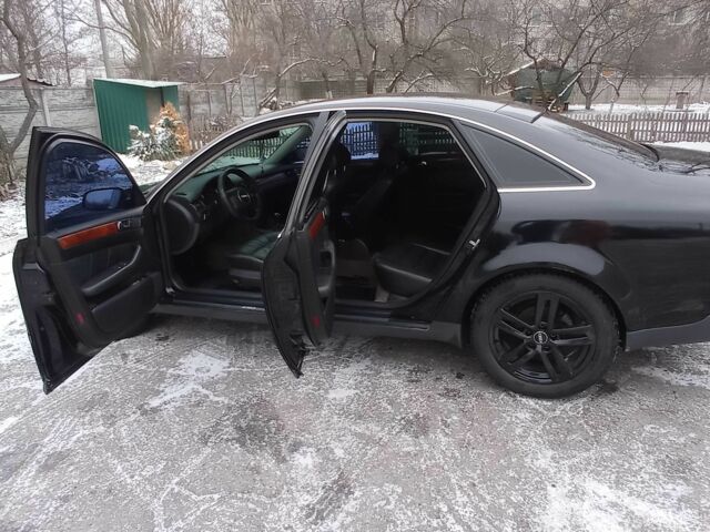 Черный Ауди А6, объемом двигателя 1.8 л и пробегом 380 тыс. км за 5500 $, фото 10 на Automoto.ua
