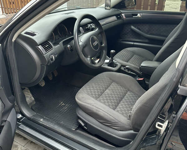 Черный Ауди А6, объемом двигателя 2.39 л и пробегом 300 тыс. км за 4399 $, фото 7 на Automoto.ua