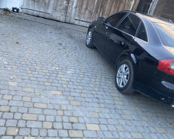Черный Ауди А6, объемом двигателя 2.5 л и пробегом 350 тыс. км за 2850 $, фото 1 на Automoto.ua