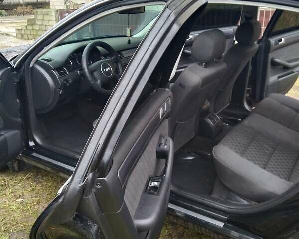 Черный Ауди А6, объемом двигателя 1.8 л и пробегом 290 тыс. км за 6200 $, фото 4 на Automoto.ua