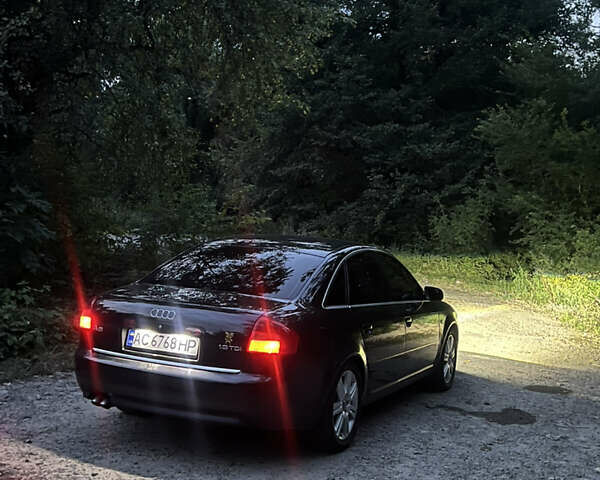 Черный Ауди А6, объемом двигателя 1.9 л и пробегом 400 тыс. км за 6300 $, фото 1 на Automoto.ua