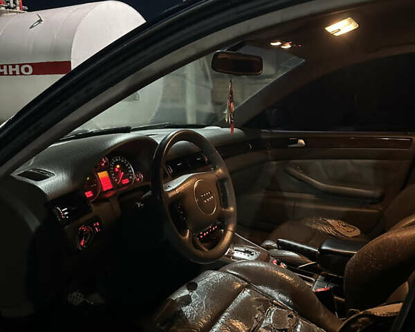 Черный Ауди А6, объемом двигателя 2.5 л и пробегом 395 тыс. км за 4000 $, фото 13 на Automoto.ua