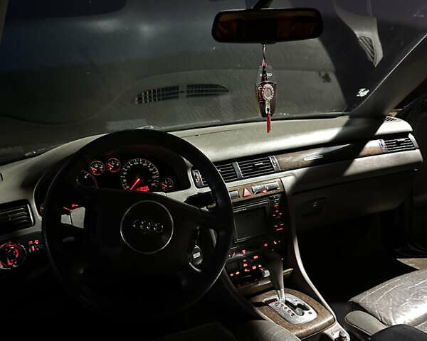 Черный Ауди А6, объемом двигателя 2.5 л и пробегом 395 тыс. км за 4000 $, фото 14 на Automoto.ua