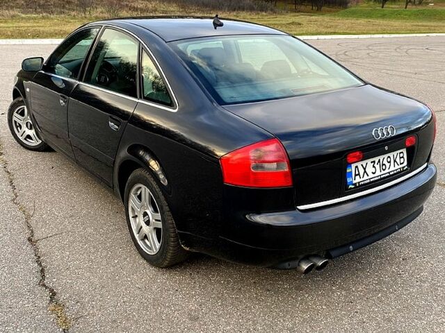 Черный Ауди А6, объемом двигателя 2.4 л и пробегом 350 тыс. км за 4200 $, фото 4 на Automoto.ua