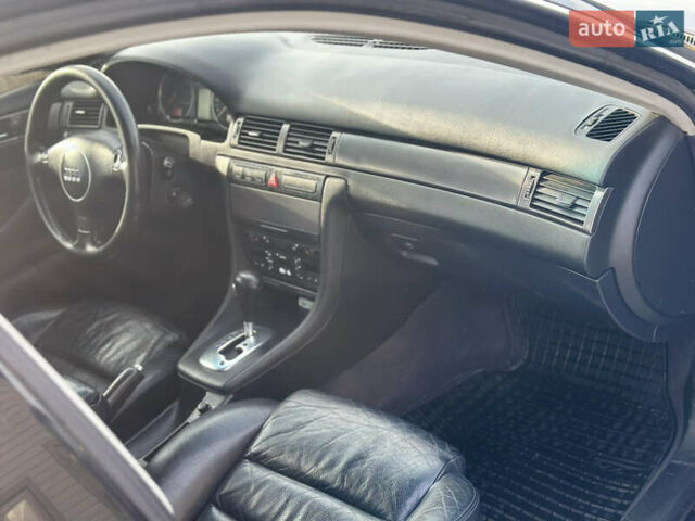 Черный Ауди А6, объемом двигателя 2.5 л и пробегом 480 тыс. км за 3400 $, фото 3 на Automoto.ua