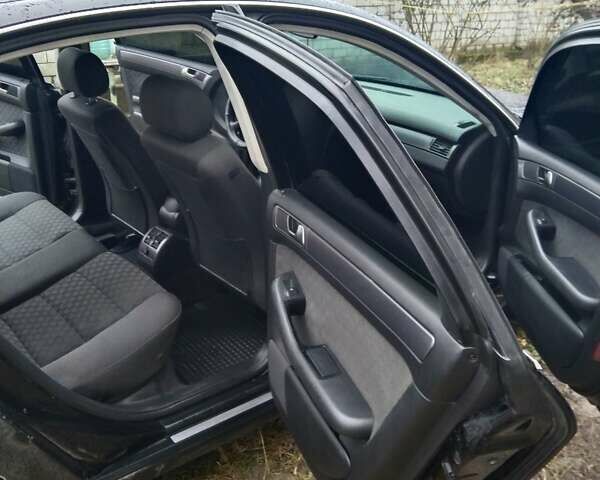 Черный Ауди А6, объемом двигателя 1.8 л и пробегом 290 тыс. км за 6200 $, фото 3 на Automoto.ua