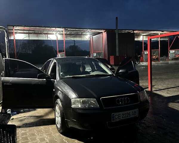 Черный Ауди А6, объемом двигателя 2.5 л и пробегом 395 тыс. км за 4000 $, фото 1 на Automoto.ua