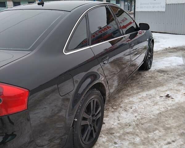 Черный Ауди А6, объемом двигателя 1.8 л и пробегом 290 тыс. км за 6200 $, фото 12 на Automoto.ua