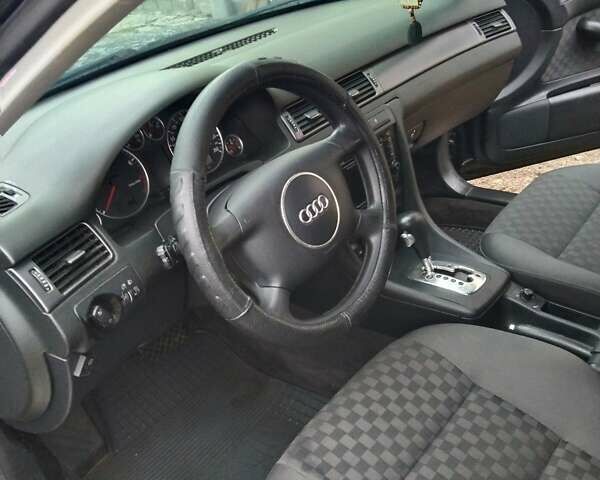 Черный Ауди А6, объемом двигателя 1.8 л и пробегом 290 тыс. км за 6200 $, фото 2 на Automoto.ua