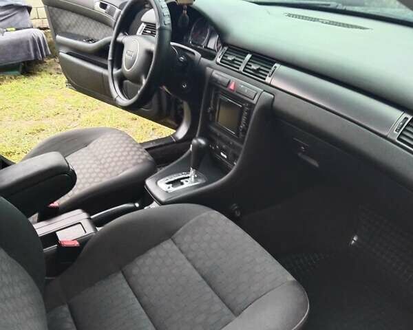 Черный Ауди А6, объемом двигателя 1.8 л и пробегом 290 тыс. км за 6200 $, фото 7 на Automoto.ua